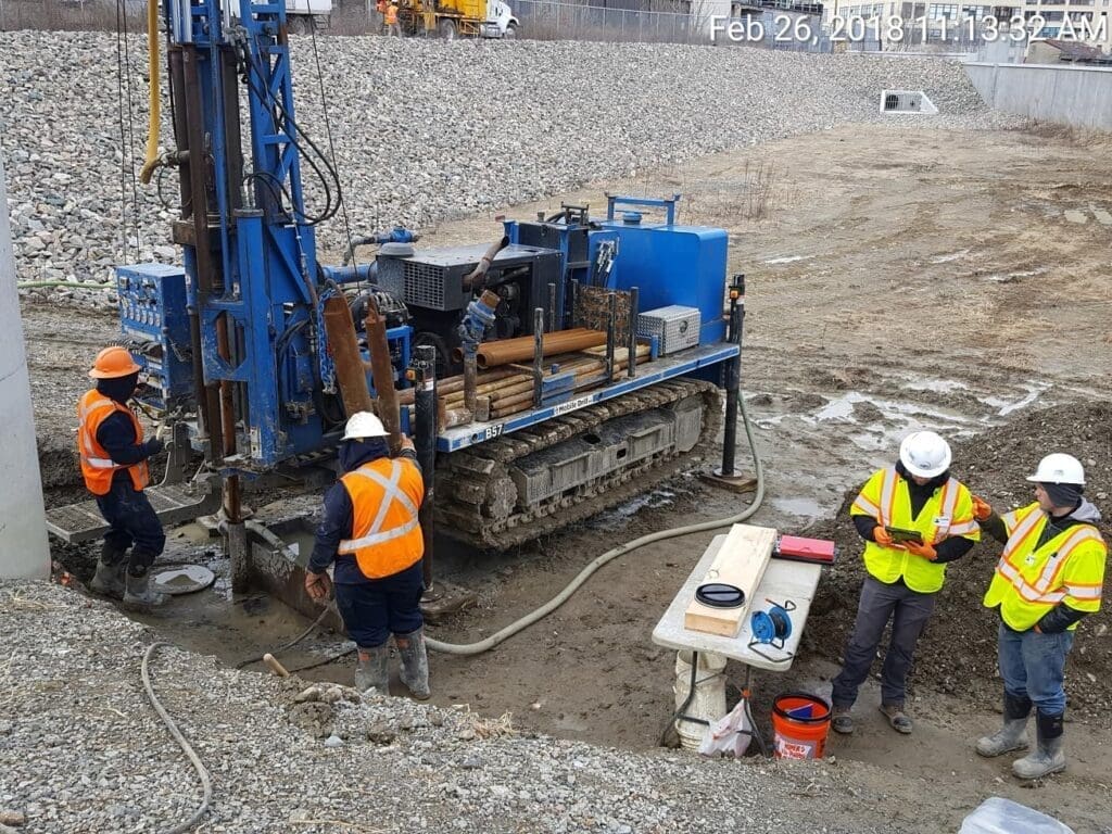 construction and engineering testing Source:https://commons.wikimedia.org/wiki/File:Geotechnical_boring_for_Red_Bridge_viaduct,_March_2018_.jpg