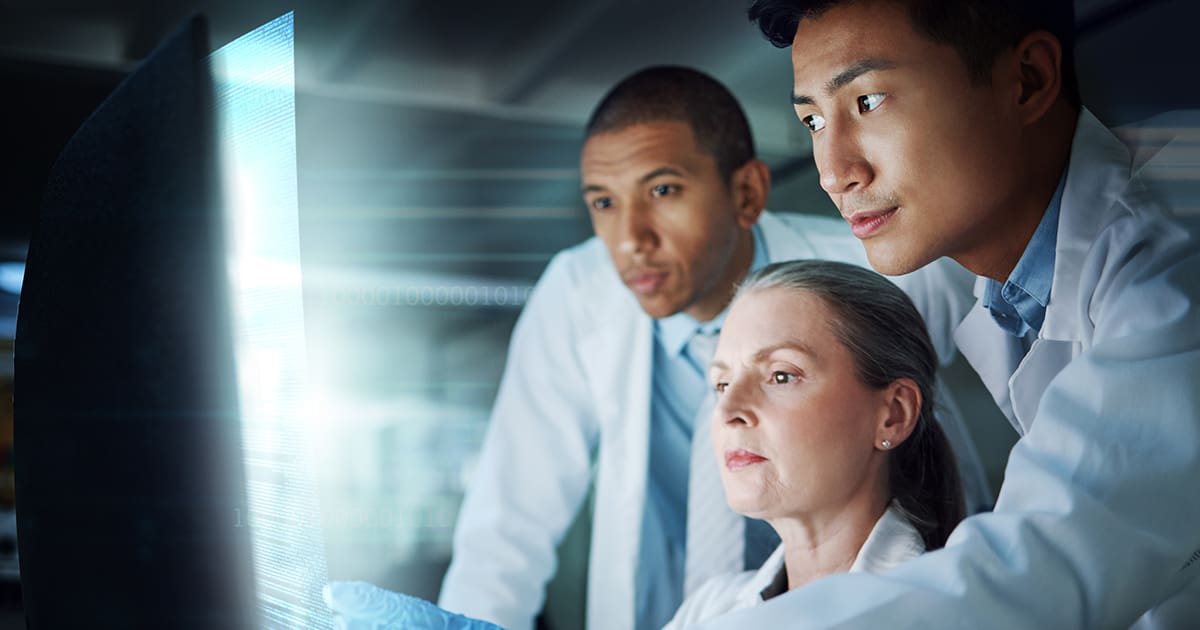 Science, future technology and medical research team at computer with hologram, information and innovation. Scientist, men and woman with holographic info, results or data on screen for collaboration - LabLynx